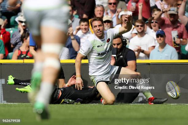 Chris Wyles of Saracens celebrates after touching down for the third try during the Aviva Premiership Final between Saracens and Exeter Chiefs at...