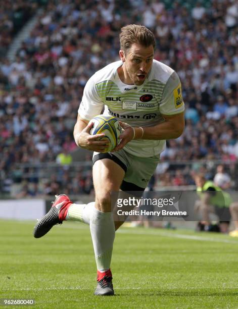 Chris Wyles of Saracens on his way to touching down for his sides third try during the Aviva Premiership Final between Saracens and Exeter Chiefs at...