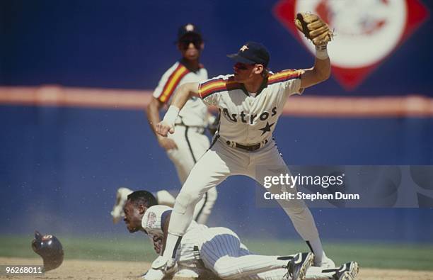 Craig Biggio of the Houston Astros makes a catch on a play at second base during their MLB game against the San Diego Padres at Jack Murphy Stadium...