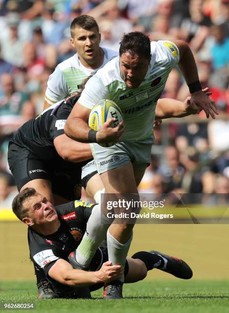 Brad Barritt of Saracens breaks away from Joe Simmonds of Exeter Chiefs during the Aviva Premiership Final between Saracens and Exeter Chiefs at...