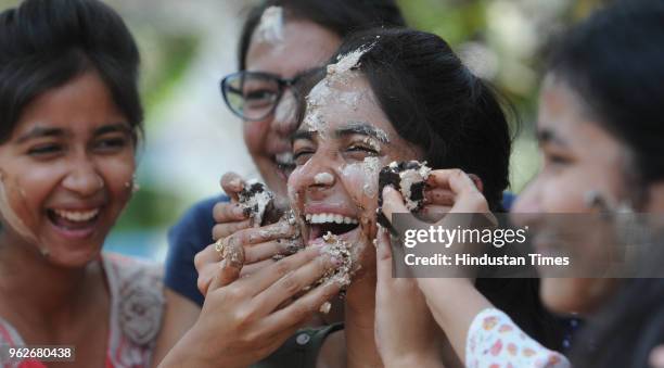 Students celebrate after the results of CBSE's 12th standard were declared, on May 26, 2018 in Patna, India. A total of 11 306 candidates registered...