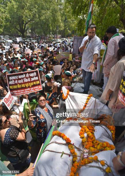 Indian Youth Congress workers and supporters protest against Narendra Modi's government for not filing the promises they made four years back in the...