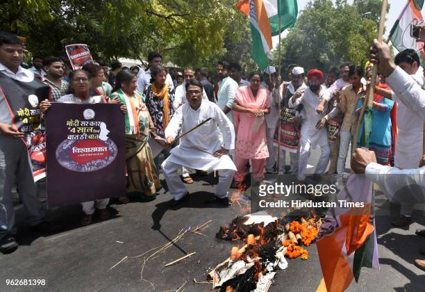 Indian Youth Congress workers and supporters protest against Narendra Modi's government for not filing the promises they made four years back in the...