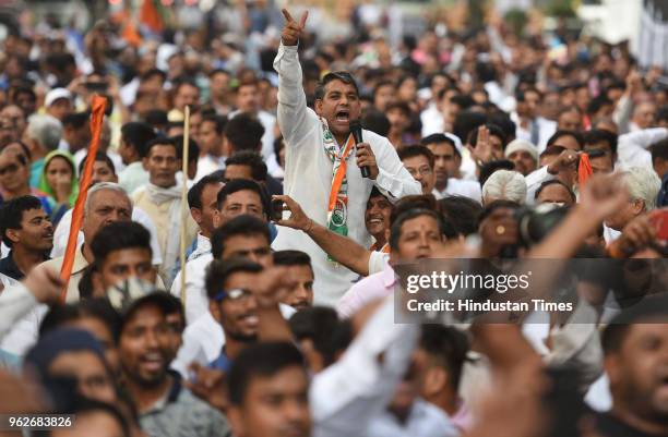 Delhi congress supporters shout slogans during a protest on the 4th anniversary of the BJP's government at Centre for not filing the promises they...