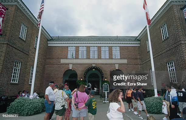 Fans gather outside the Baseball Hall of Fame on July 24, 2000 in Cooperstown, New York.
