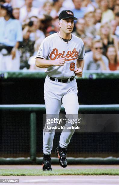 Cal Ripken Jr. Of the American League runs onto the field during the MLB All-Star Game at Coors Field on July 7, 1998 in Denver, Colorado. The...