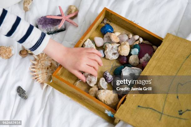 little boy (4-5) with box full of treasures - geode stock pictures, royalty-free photos & images