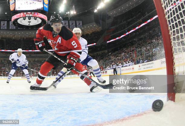 Zach Parise of the New Jersey Devils scores his first of two goals in the first period against the Toronto Maple Leafs at the Prudential Center on...