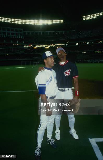 Roberto Alomar of the Toronto Blue Jays greets Sandy Alomar, Jr of the Cleveland Indians before the 1991 All - Star Game game at Toronto SkyDome on...