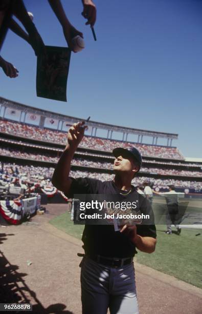 Cal Ripken Jr. Signs autographs prior to the 1992 MLB All-Star Game at Jack Murphy Stadium on July 13, 1992 in San Diego, California.