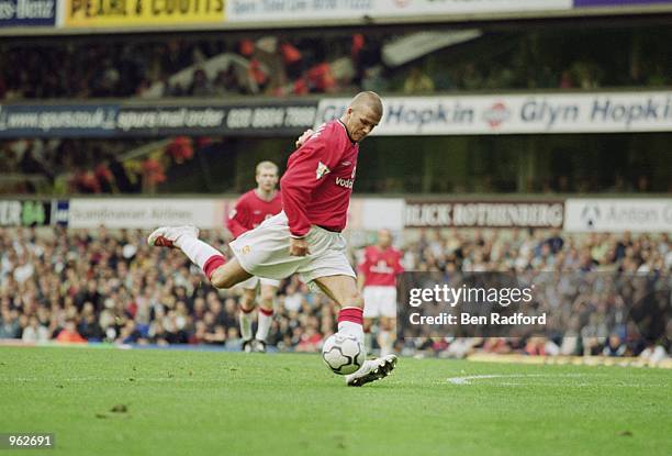 David Beckham of Man Utd shoots to score their 5th and final goal during the FA Barclaycard Premiership match between Manchester United and Tottenham...