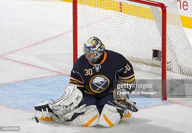 Ryan Miller#30 of the Buffalo Sabres makes a pad save against the Boston Bruins at HSBC Arena on January 29, 2010 in Buffalo, New York.