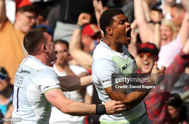 Nathan Earle of Saracens celebrates after scoring his sides fourth try during the Aviva Premiership Final between Saracens and Exeter Chiefs at...