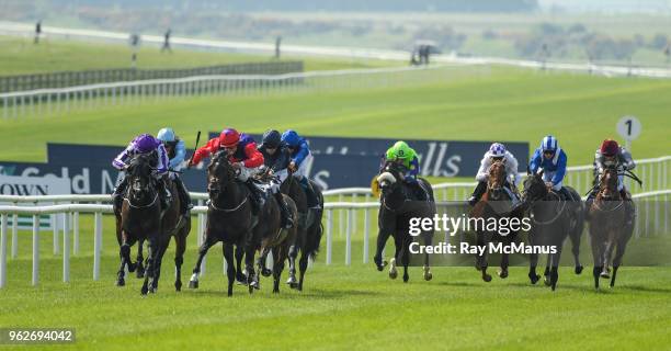 Kildare , Ireland - 26 May 2018; Romanised, with Shane Foley up, third from left, on their way to winning the Tattersalls Irish 2,000 Guineas Group 1...