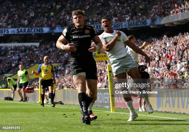 Nathan Earle of Saracens celebrates after scoring his sides fourth try during the Aviva Premiership Final between Saracens and Exeter Chiefs at...