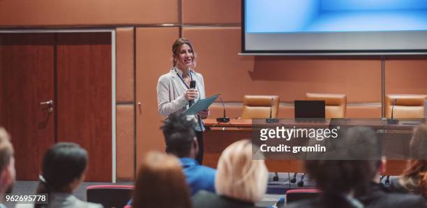 public speaker at science convention - multimedia presentation stock pictures, royalty-free photos & images
