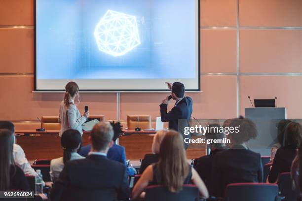 public speaker at science convention - multimedia presentation stock pictures, royalty-free photos & images