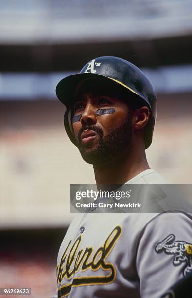 Harold Baines of the Oakland Athletics looks on during a game in the 1991 season against the California Angels at Anaheim Stadium in Anaheim,...