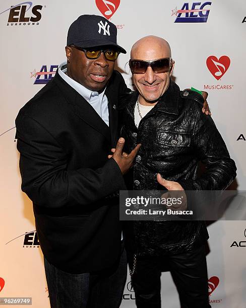 Musician Vince Wilburn Jr. And drummer Kenny Aronoff arrive at the 2010 MusiCares Person Of The Year Tribute To Neil Young at the Los Angeles...