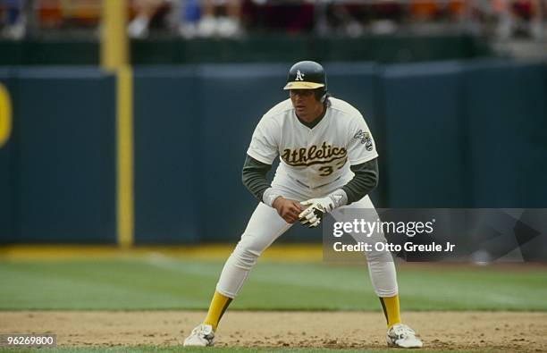 Jose Canseco of the Oakland Athletics leads off during the game against the Baltimore Orioles at Oakland-Alameda County Coliseum on July 14, 1991 in...