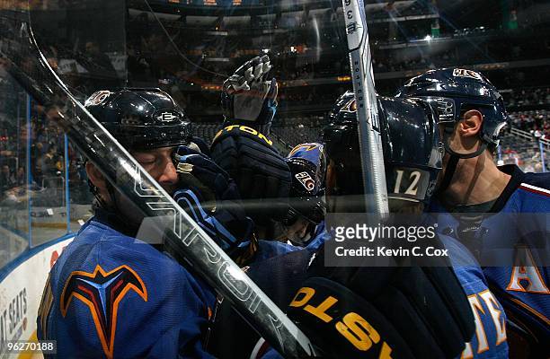 Eric Boulton of the Atlanta Thrashers reacts after scoring a goal against the Ottawa Senators with Todd White at Philips Arena on January 12, 2010 in...