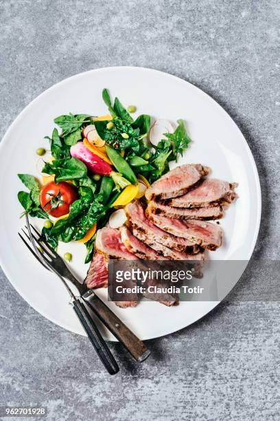 steak with salad - golden beet stock pictures, royalty-free photos & images