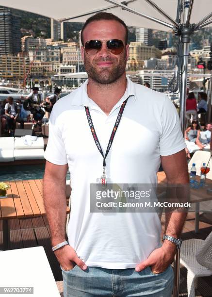Jamie Roberts poses for photo on the Red Bull Racing Energy Station during the Monaco Formula One Grand Prix at Circuit de Monaco on May 26, 2018 in...