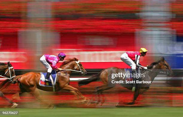 Jockey Glen Boss riding Grand Destiny races in the TAB BIG6 Mega Jackpot Handicap during the Coolmore Lightning Stakes Day meeting at Flemington...