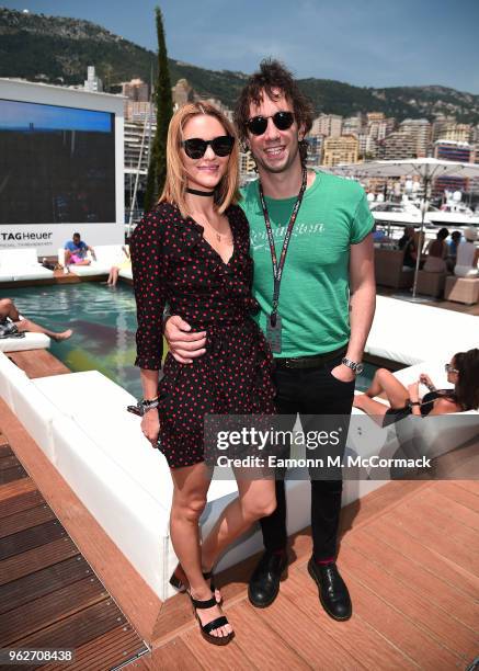 Albert Hammond Jr and wife, Justyna Sroka pose for a photo on the Red Bull Racing Energy Station during the Monaco Formula One Grand Prix at Circuit...