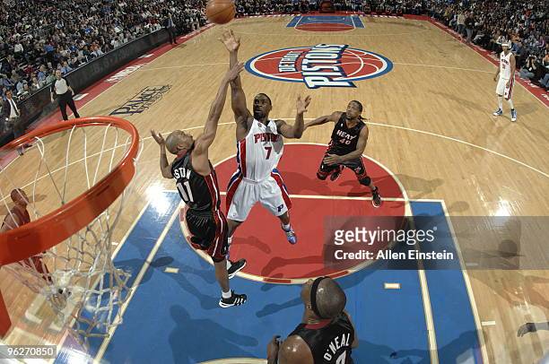 Ben Gordon of the Detroit Pistons goes up for a shot attempt against Rafer Alston of the Miami Heat in a game at the Palace of Auburn Hills on...