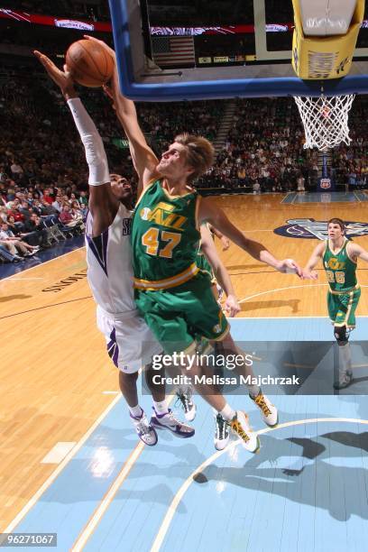 Andrei Kirilenko of the Utah Jazz blocks the shot of Jason Thompson of the Sacramento Kings at EnergySolutions Arena on January 29, 2010 in Salt Lake...