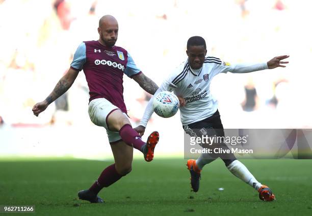 Alan Hutton of Aston Villa battles for possession with Ryan Sessegnon of Fulham during the Sky Bet Championship Play Off Final between Aston Villa...