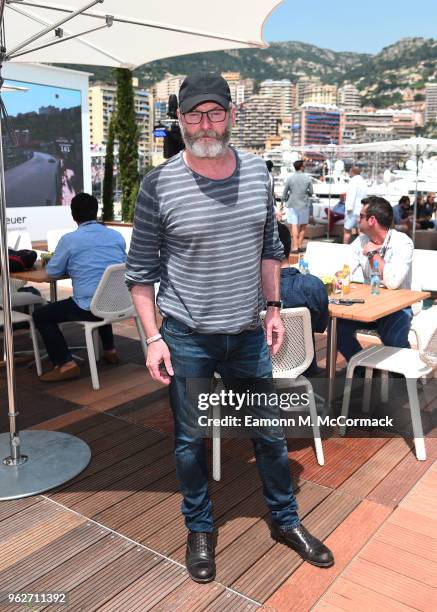 Liam Cunningham poses for a photo on the Red Bull Racing Energy Station during the Monaco Formula One Grand Prix at Circuit de Monaco on May 26, 2018...