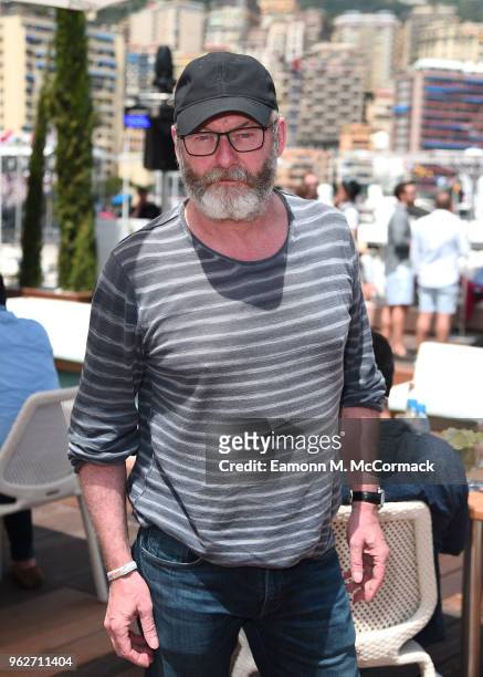 Liam Cunningham poses for a photo on the Red Bull Racing Energy Station during the Monaco Formula One Grand Prix at Circuit de Monaco on May 26, 2018...