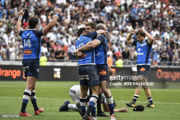 Castres' players react after winning the French Top 14 rugby union semi-final match between Racing 92 and Castres Olympique on May 26, 2018 at the...