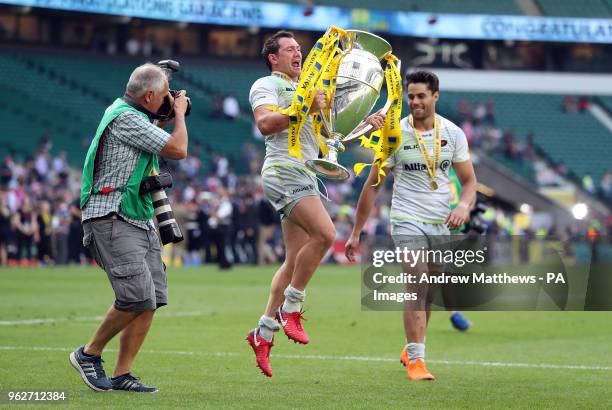 Saracens' Alex Goode celebrates with the trophy after his side win the Aviva Premiership Final at Twickenham Stadium, London.