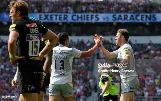 Chris Wyles of Saracens celebrates with Alex Lozowski after scoring their third tryduring the Aviva Premiership Final between Exeter Chiefs and...