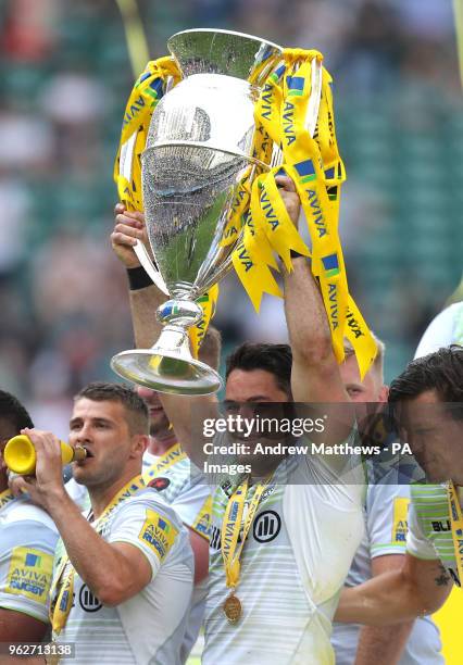 Saracens' Brad Barritt lifts the trophy after his side win the Aviva Premiership Final at Twickenham Stadium, London.