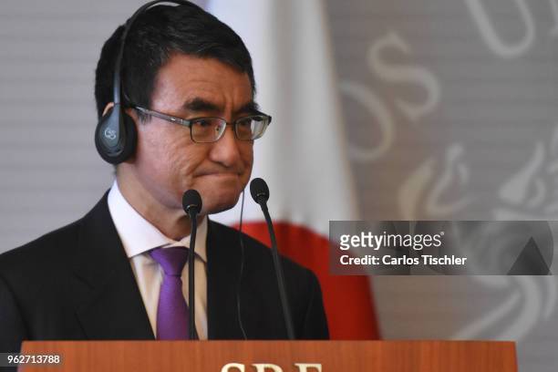 Minister of Foreign Affairs of Japan, Taro Kono gestures during a press conference as part of his welcome reception on May 24, 2018 in Mexico City,...