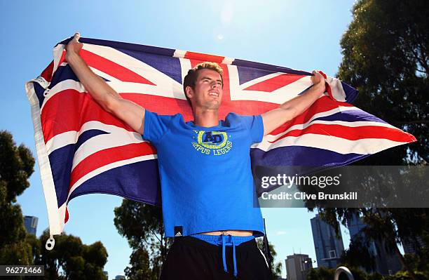 Andy Murray of Great Britain poses with the Union Jack flag during day thirteen of the 2010 Australian Open at Melbourne Park on January 30, 2010 in...