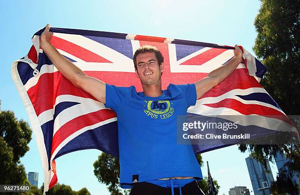 Andy Murray of Great Britain poses with the Union Jack flag during day thirteen of the 2010 Australian Open at Melbourne Park on January 30, 2010 in...
