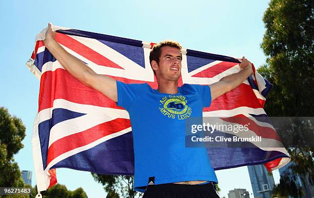 Andy Murray of Great Britain poses with the Union Jack flag during day thirteen of the 2010 Australian Open at Melbourne Park on January 30, 2010 in...