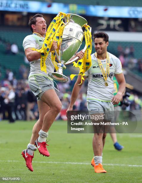 Saracens' Alex Goode celebrates with the trophy after his side win the Aviva Premiership Final at Twickenham Stadium, London.