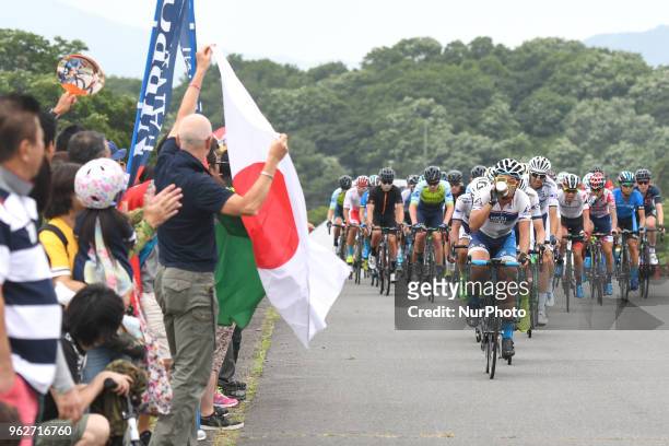 Members of Kinan Cycling Team lead the peloton during Izu stage, 120.8km on Izu-Japan Cycle Sports Center Road Circuit, the seventh stage of Tour of...