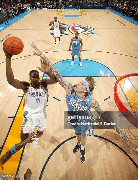 Serge Ibaka of the Oklahoma City Thunder shoots against Chris Andersen of the Denver Nuggets on January 29, 2010 at Ford Center in Oklahoma City,...