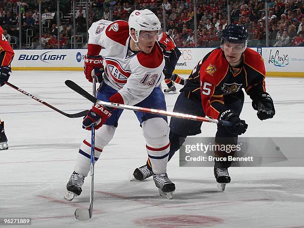 Rostislav Olesz of the Florida Panthers pursues Michael Cammalleri of the Montreal Canadiens at the BankAtlantic Center on January 26, 2010 in...