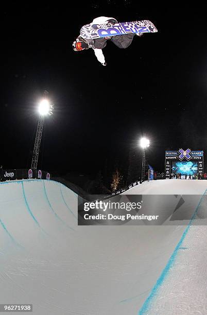 Shaun White does a backside air above the halfpipe enroute to winning the gold medal in the Men's Snowboard Superpipe at Winter X Games 14 at...