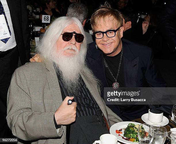 Musicians Leon Russell and Elton John attend the 2010 MusiCares Person Of The Year Tribute To Neil Young at the Los Angeles Convention Center on...