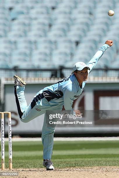 Angela Reakes of the Breakers bowls during the WNCL Final match between the NSW Breakers and the DEC Victoria Spirit held at the Melbourne Cricket...
