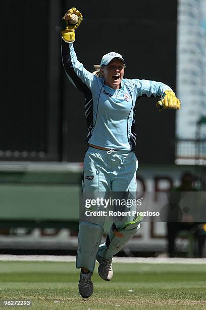 Wicket Keeper Alyssa Healy of the Breakers celebrates taking a catch to dismiss Renee Melton of the Spirit during the WNCL Final match between the...